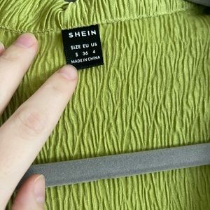 Womens button up top. Size small. Like new condition.